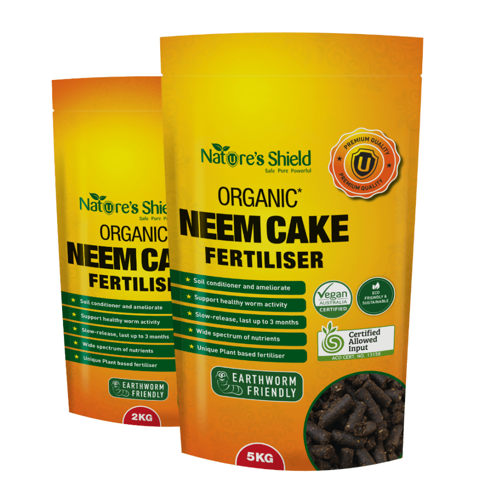 Organic neem cake fertiliser powder applied to soil as a natural plant nutrient and pest control solution.