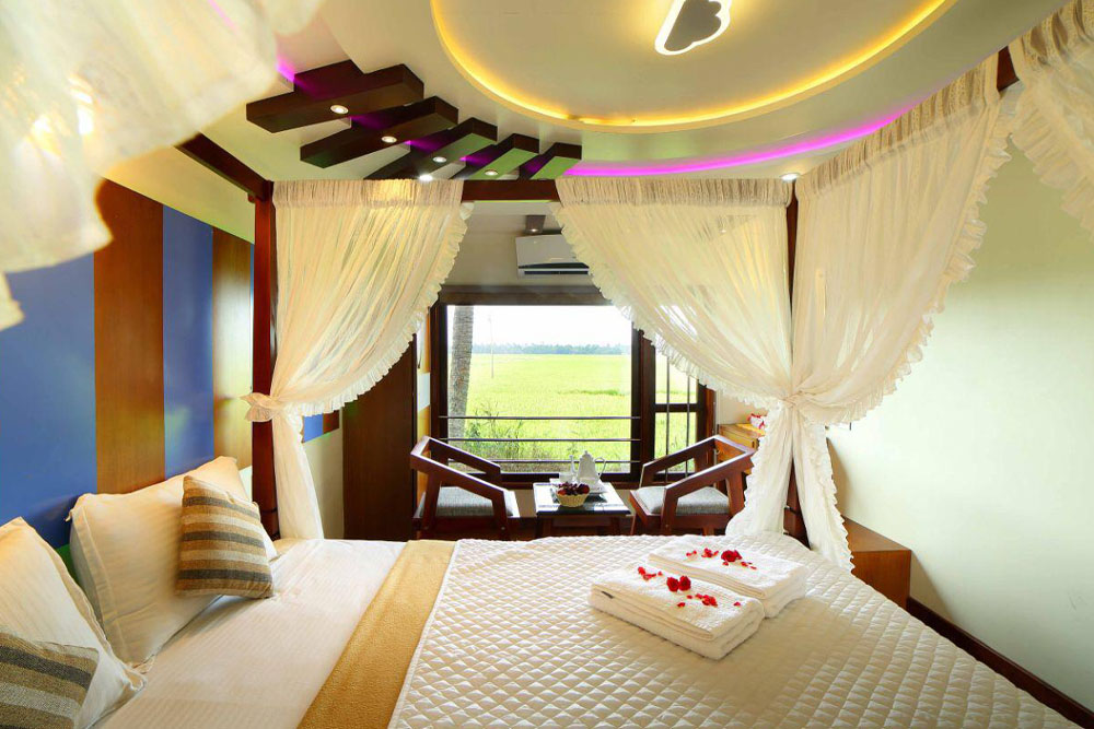 Flower-decorated bedrooms open to serene views of lush paddy fields through large windows, creating a romantic and peaceful stay.