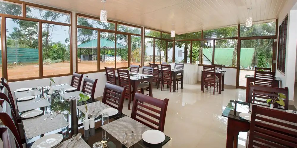 Multi-cuisine restaurant at Misty Lake Resort, Munnar serving delectable Kerala, Indian, and continental dishes