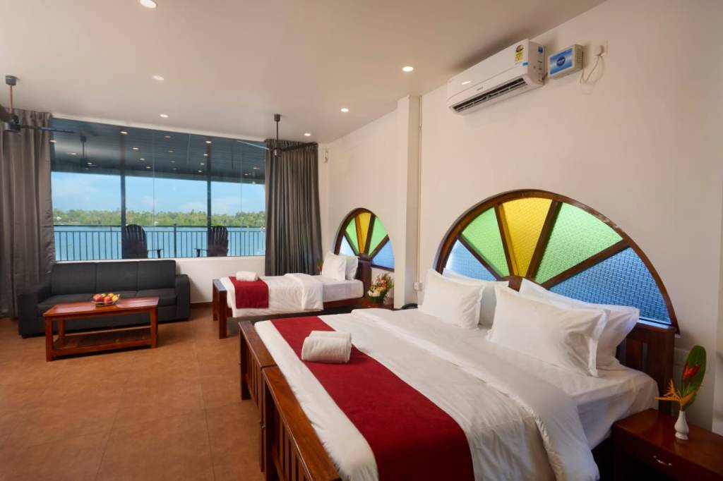 “Akanta Ayurveda & Yoga Cherai bedroom with traditional Kerala décor and serene ambiance”