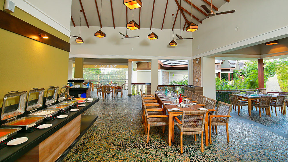 Guests enjoying multi cuisine dining at Morickap Resort Wayanad