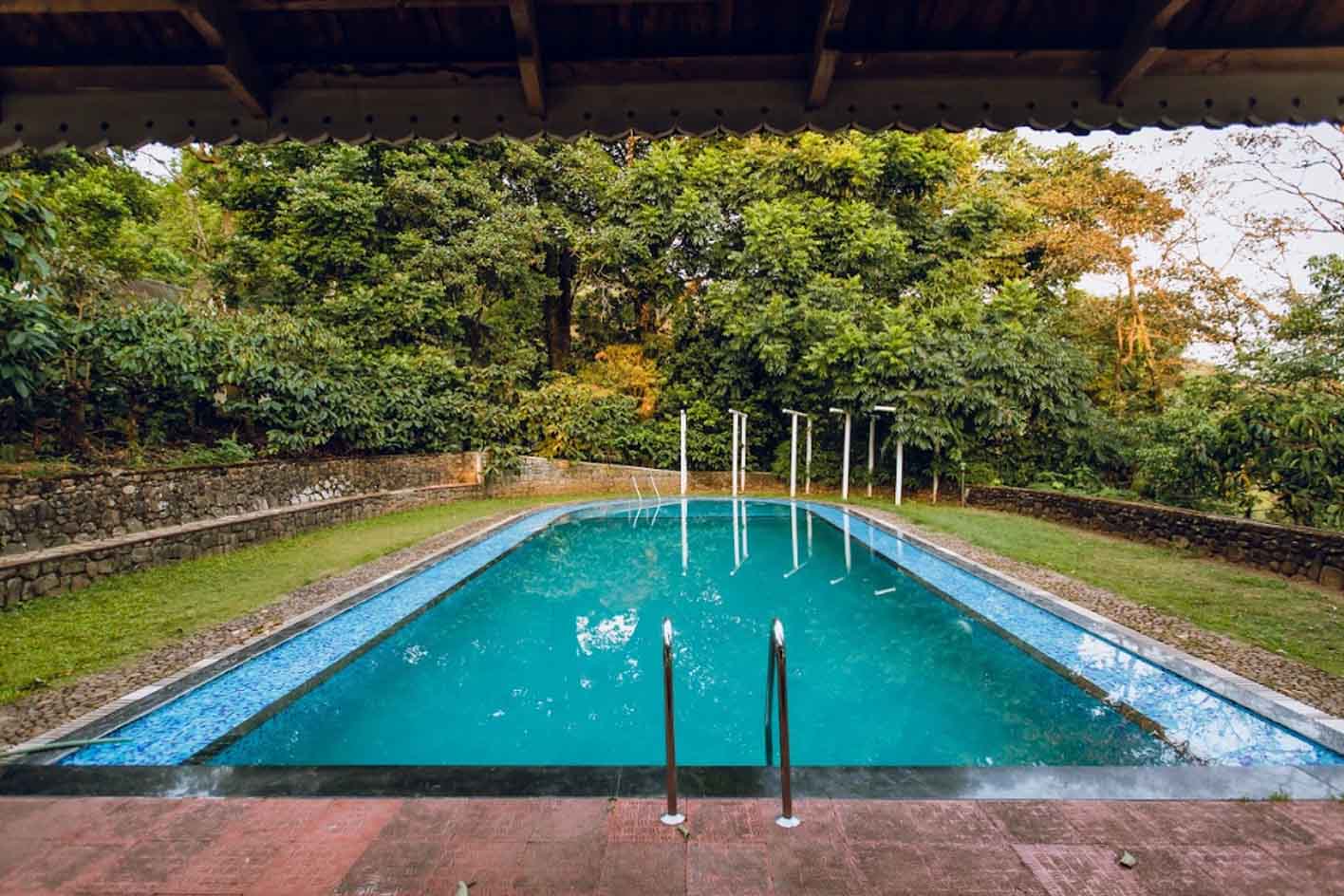 Nature-Friendly Stay at a Resort with Pool in Coorg
