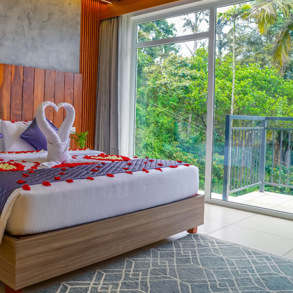 Spacious bedroom at Winternote Munnar featuring elegant interiors, modern comforts, and a relaxing atmosphere.